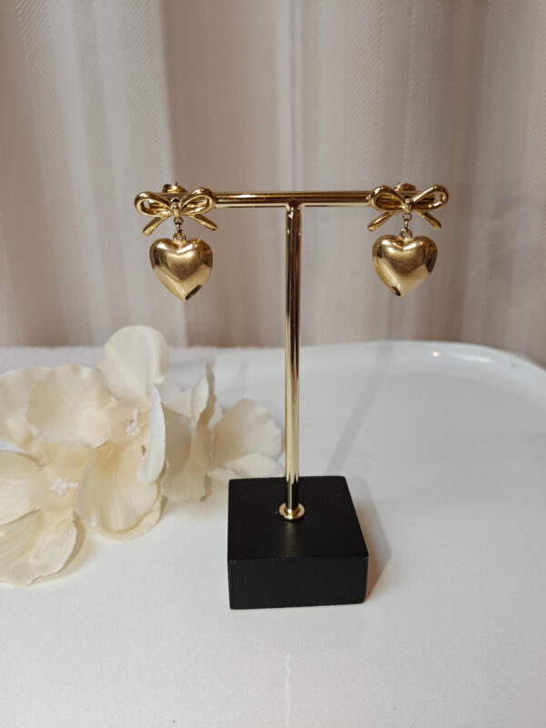 Oorbellen strik hart - Goud