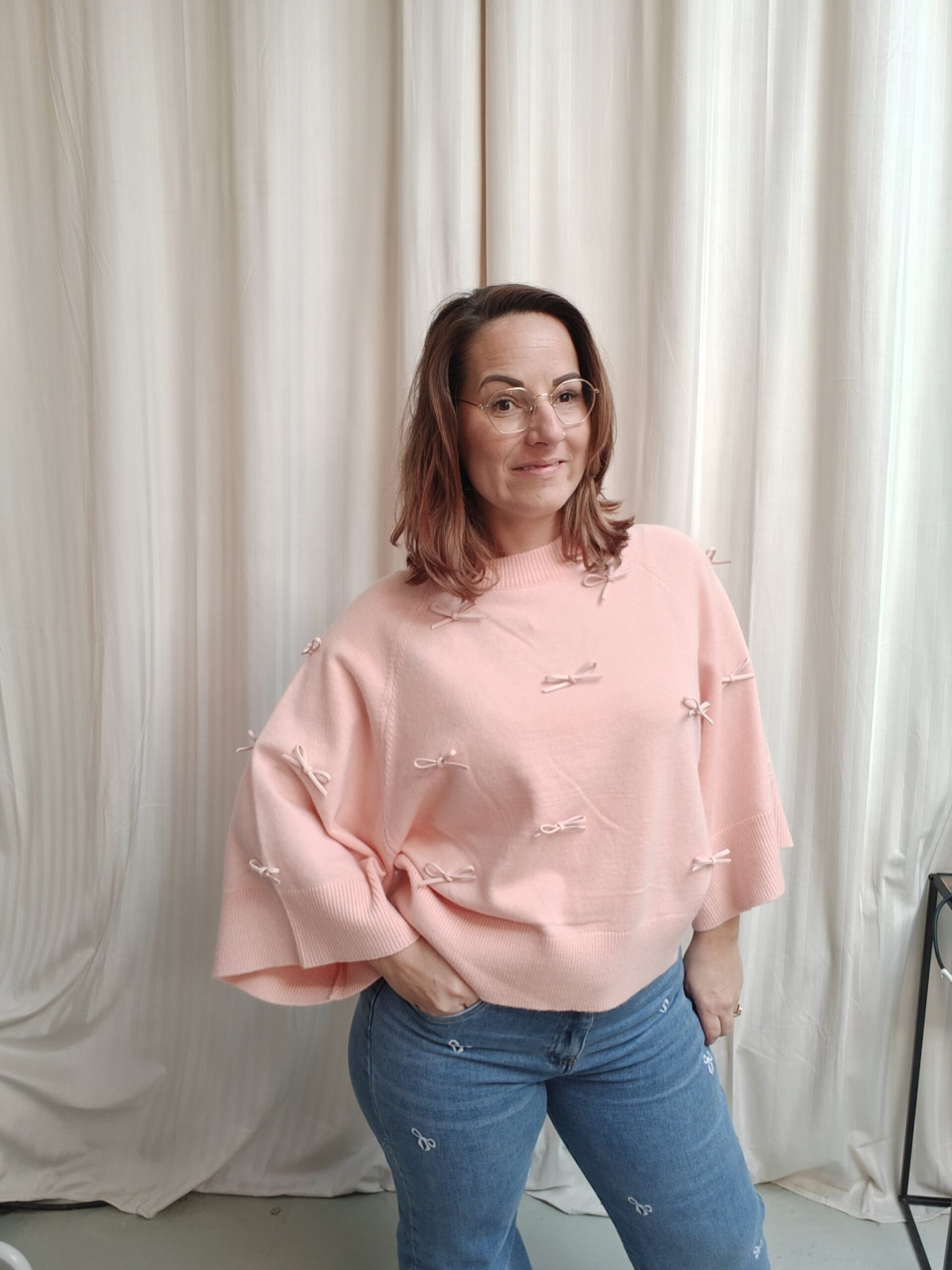 Trui strikjes zacht roze